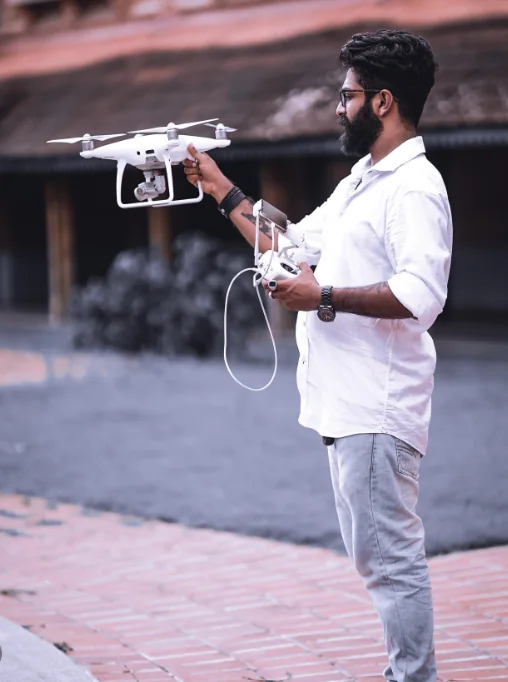 Althaf P Rasheed flying a drone