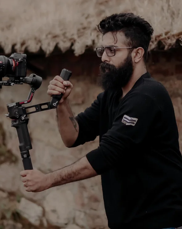 Althaf P Rasheed filming with a gimbal camera